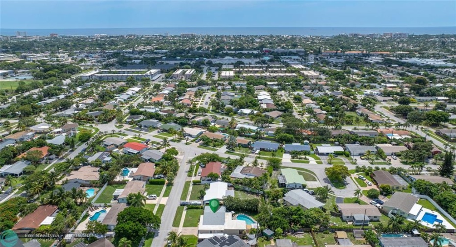 Home & neighborhood with ocean in background