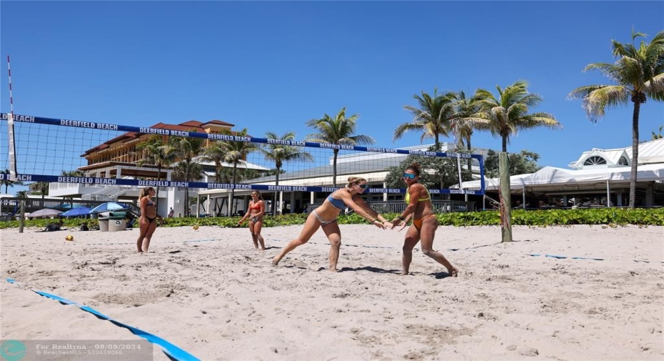 Multiple volleyball courts on Deerfield Beach that hosts national tournements