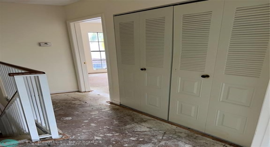 LAUNDRY CLOSET AND LINEN CLOSET IN HALLWAY UPSTAIRS