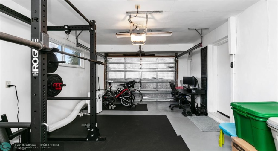 Garage with impact large door & remote for ease of use.