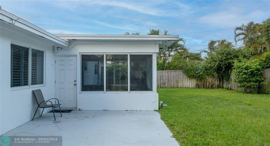 Open patio with fully fence backyard