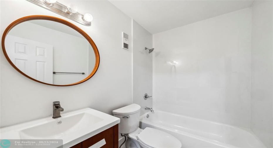 Second Bathroom Featuring Contemporary Details and Bathtub and Shower