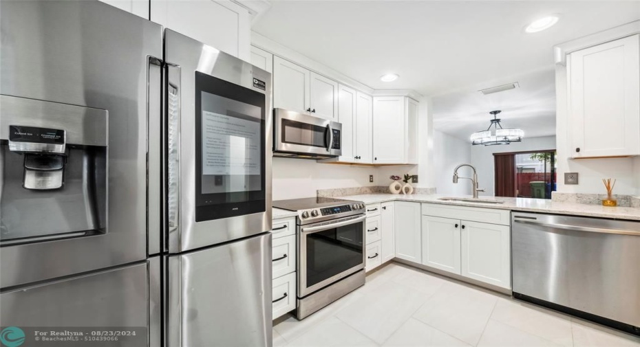 Fresh White Cabinets. Quartz Counter Tops.