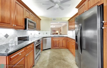 Gorgeous and Spacious Kitchen with updated Cabinets and Granite Countertops w All Newer SS Appliances!