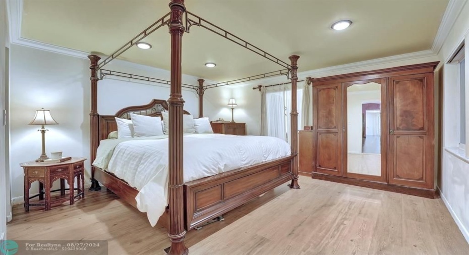 Newly painted primary bedroom with walk-in closet.