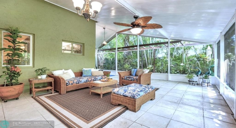 View of patio/sun room from primary suite.