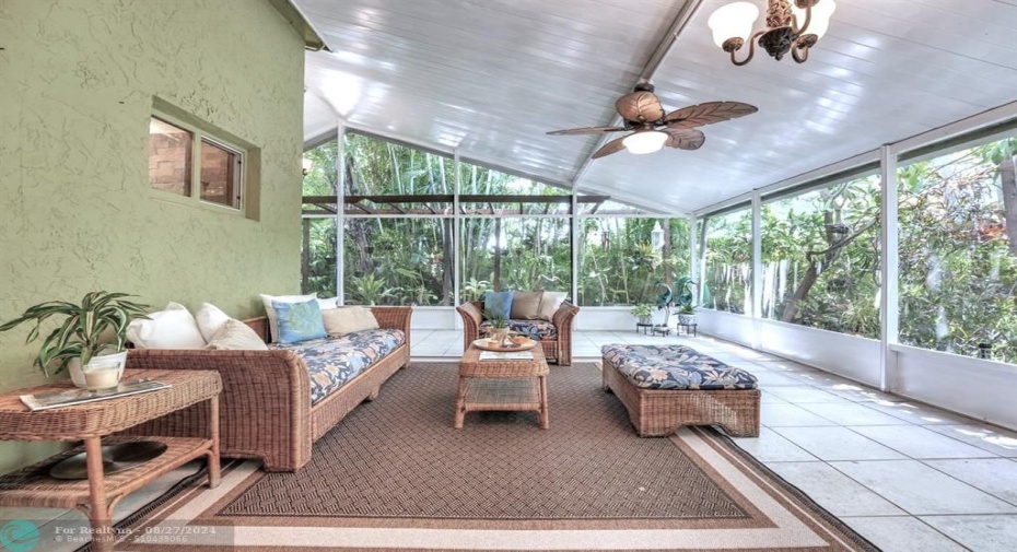 The large Florida-Room style patio creates a Zen-like indoor-outdoor space to relax.