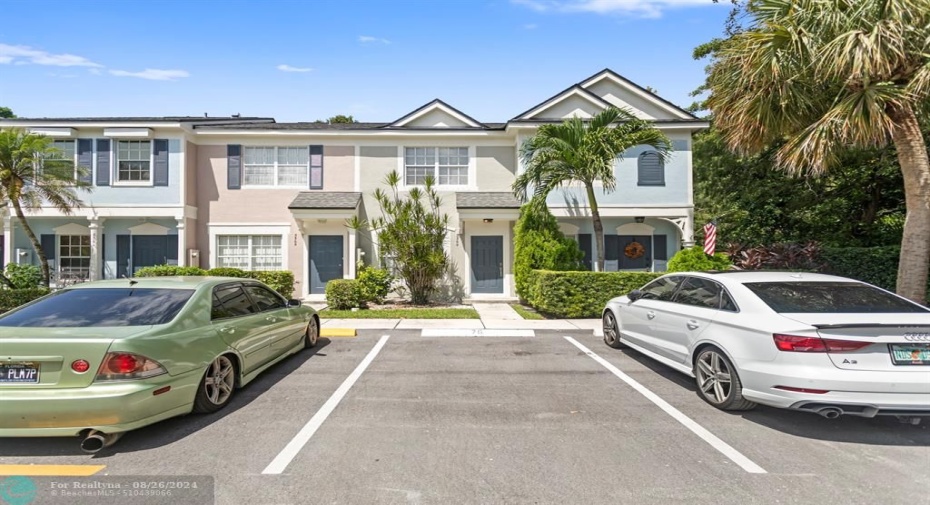 Parking spot in front of door and plenty of guest parking