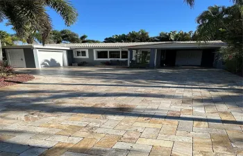 Front Entrance with Carport and Garage