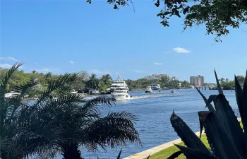 Sit at the pool and watch the boats go by.