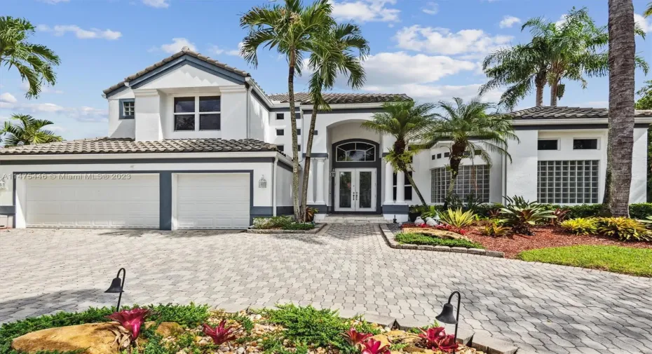 Circular Driveway and 3 Car Garage