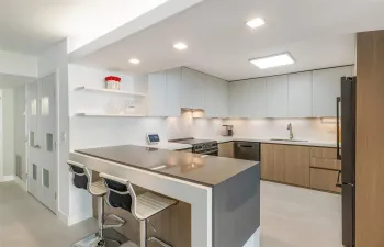 New Kitchen with waterfall quartz counters