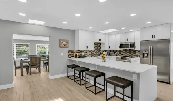 Spacious, modern kitchen with large quartz counter