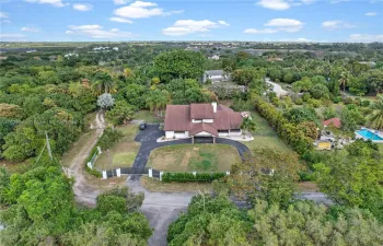 AERIAL VIEW  ENLARGE PHOTOUPDATED 4/3 HOME W/ ASST. FRUIT TREES ON SHY 1 ACRE. LARGE REAR YARD W ROOM FOR GUEST HOME AND POOL PLUS..LOCATED ON A DEAD END STREET...NORTH SOUTH FRONTAGE.  SHHHHES A BIG GIRL!!!