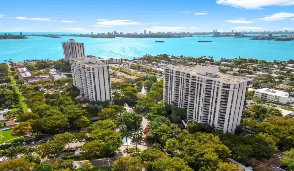 expansive views of the pool area and lush tropical gardens and fountains from every window