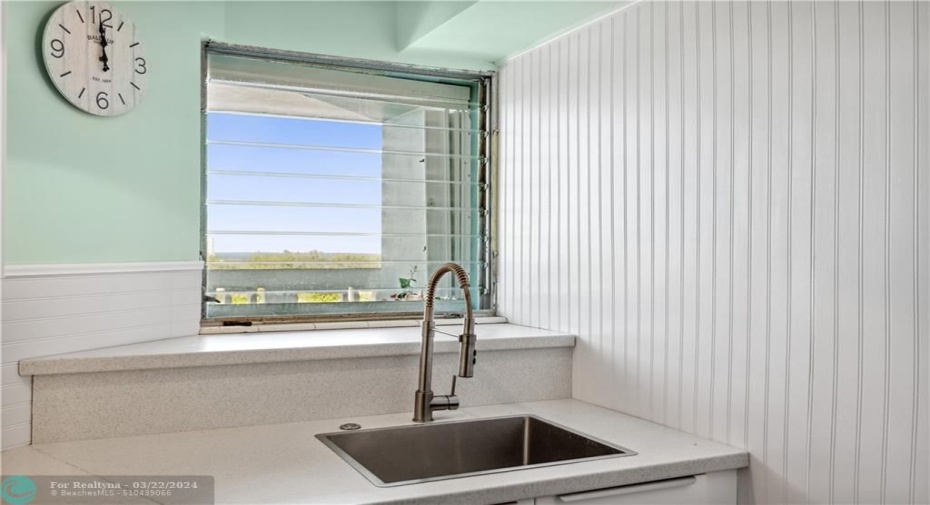 Look at the ocean while you wash dishes.