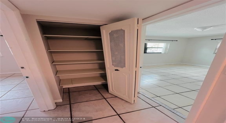 Linen Closet at end of hallway