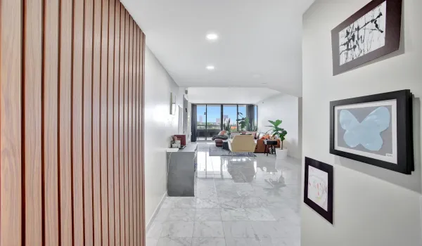 Foyer entry.  Sliding door to den