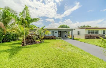 Lush landscaping and welcoming curb appeal.