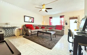 Furnished Spacious Living Area W/ Crown Molding