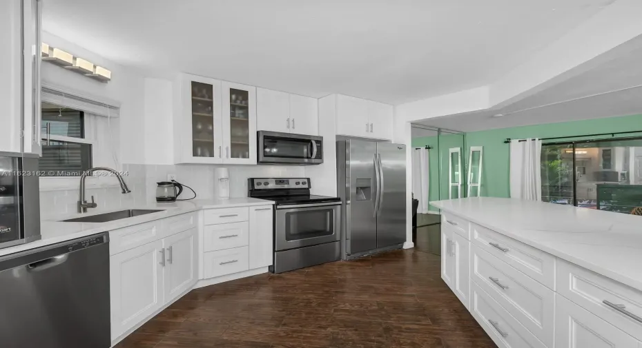 Gorgeous kitchen with quartz countertops with functional island