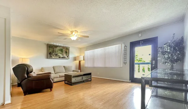 Entrance Into Living Area w/ Hurricane Door Letting in Sunlight!