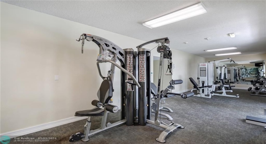 Exercise and weight room in club house.