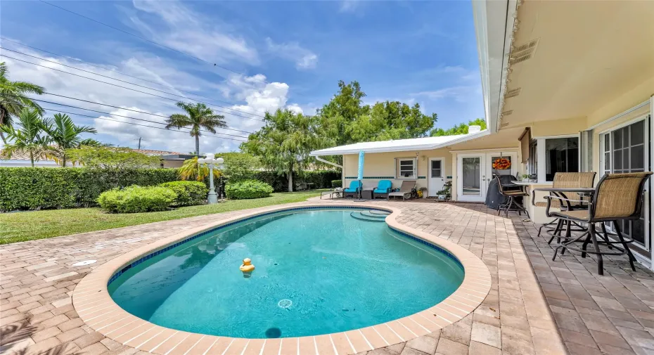 Freeform pool and fenced yard on this great 3 Bed/ 2 Bath home in Lighthouse Point