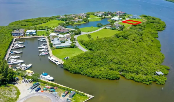 Beautiful riverfront lot + 65' marina slip