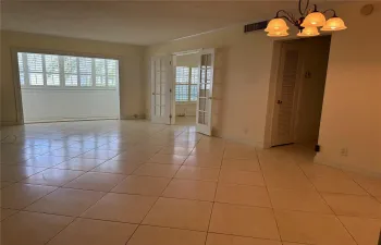 Living Sunroom Guest Room with French Doors