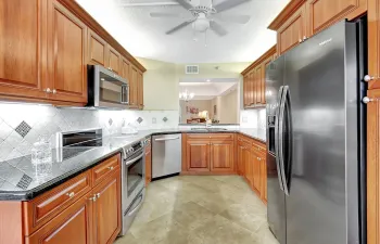 Gorgeous and Spacious Kitchen with updated Cabinets and Granite Countertops w All Newer SS Appliances!