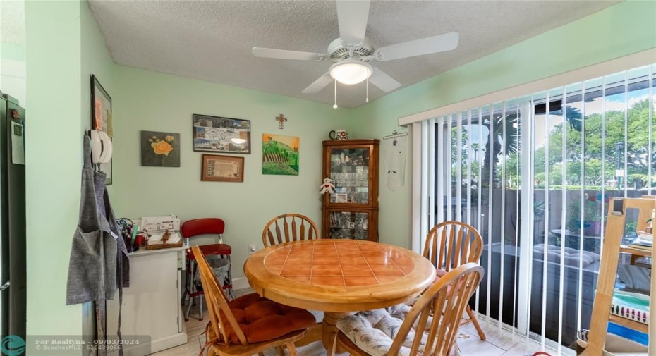 BREAKFAST ROOM LOOKS AT PATIO