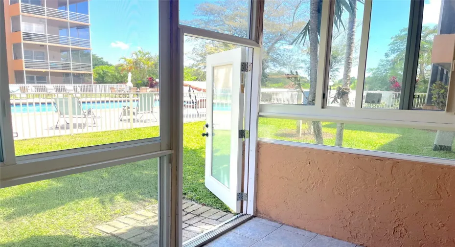 Newly enclosed patio, with impact windows and door