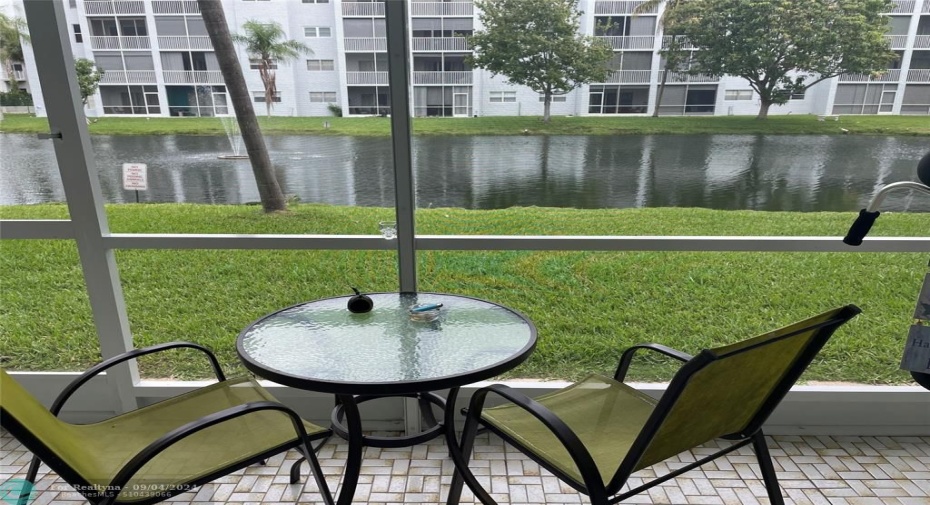 Patio  with pretty view of lake and fountain