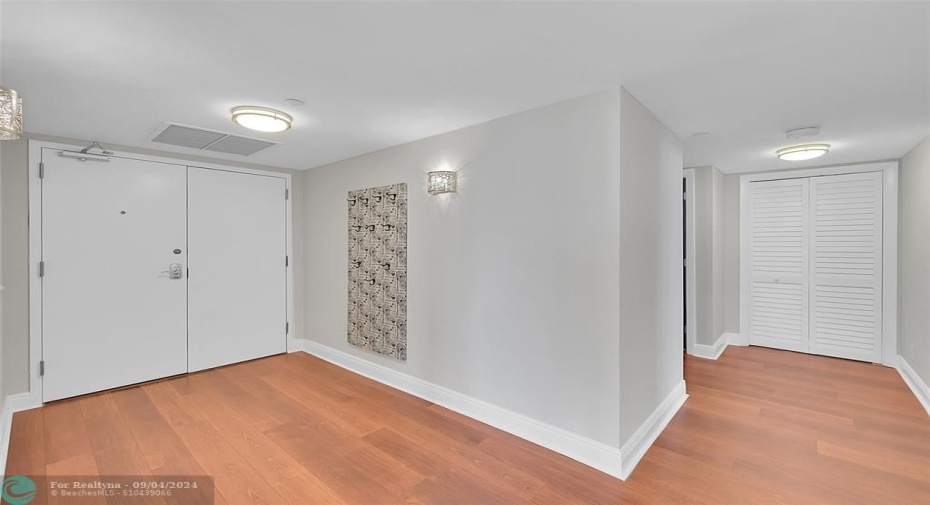 Large foyer with double door entry