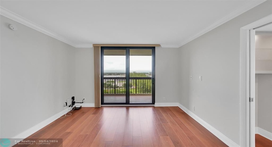 Third bedroom is being used as a den/office with balcony