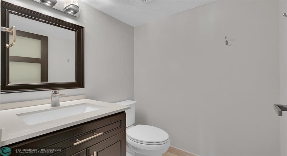 Convenient half bath near laundry