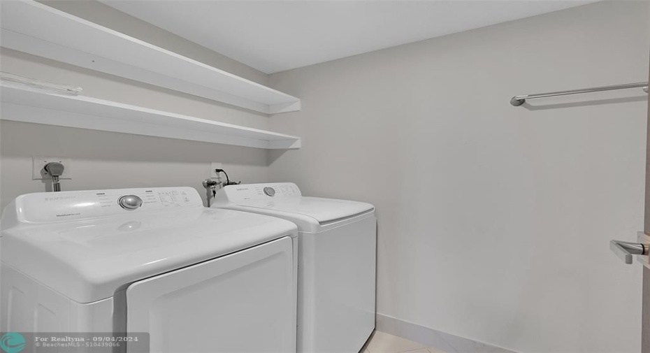 Large laundry room with lots of storage