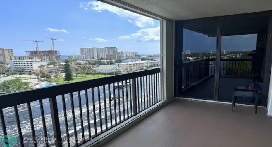 View from your large balcony with impact doors and accordion shutters for added protection