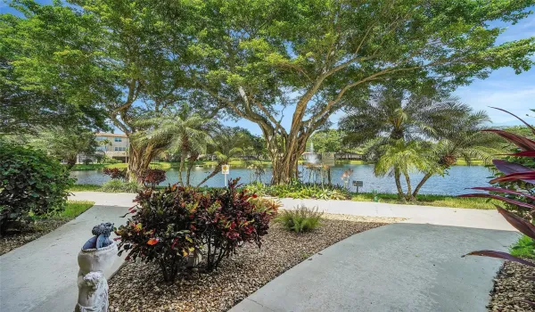 Tree shaded walking path around the lake
