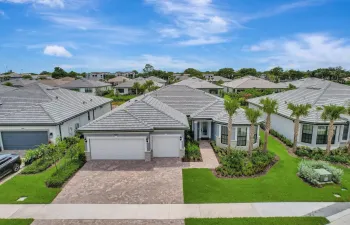 Front with 3 car drive way and oversized 3 car garage