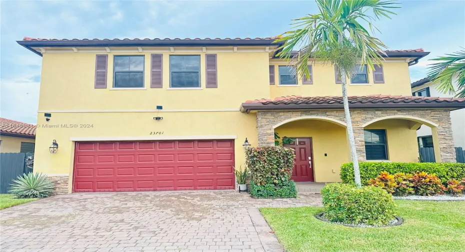 2 car garage, paved driveway