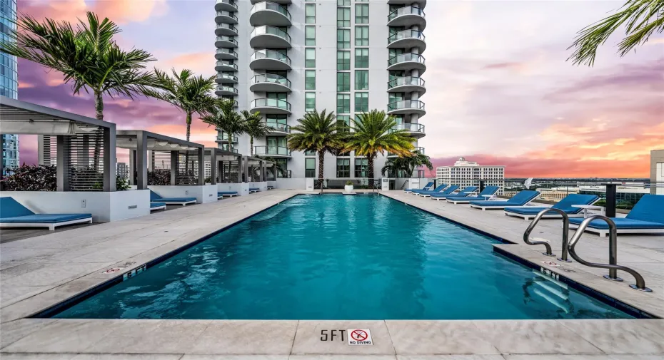 Stunning rooftop pool + cabanas + 360 views