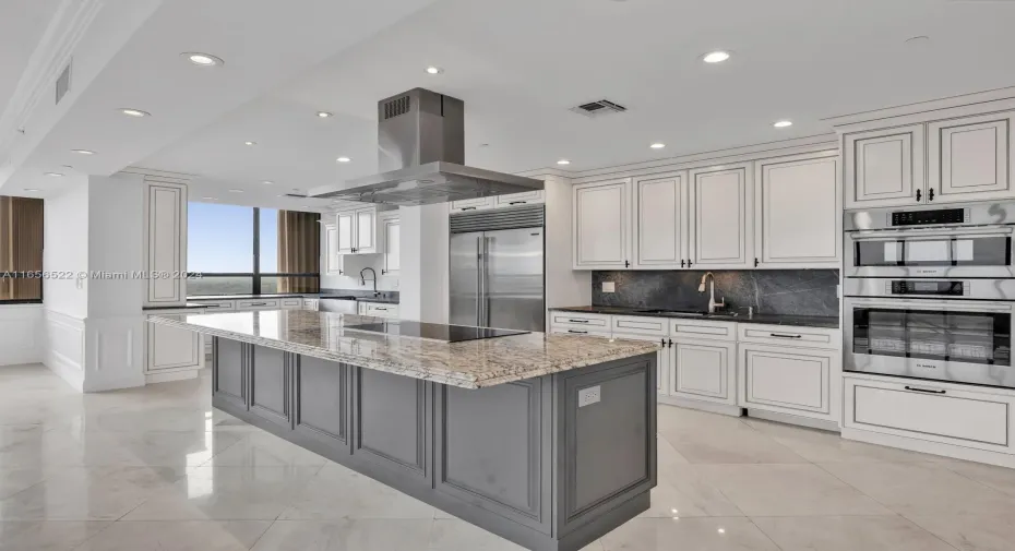 Massive, Open Kitchen with Top-of-the-line Appliances & Ample Storage