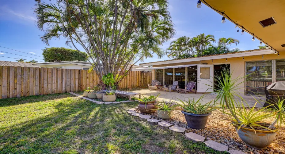 This lovely home is set on a spacious fenced lot with a patio overlooking the garden.