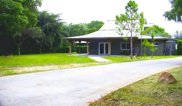 View from backyard showing standing seam tin roof