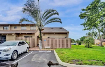 GREAT CORNER UNIT WITH LARGE FENCED IN FRONT PATIO