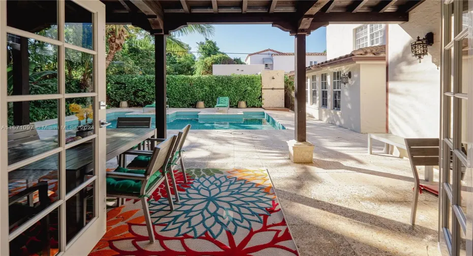 French Doors open up to the Georgous Pool