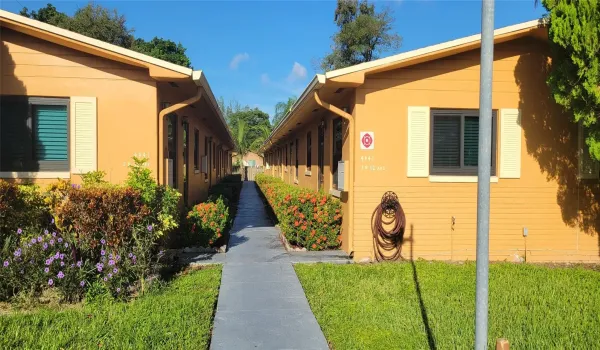 Entrance walkway to unit at the end on the right
