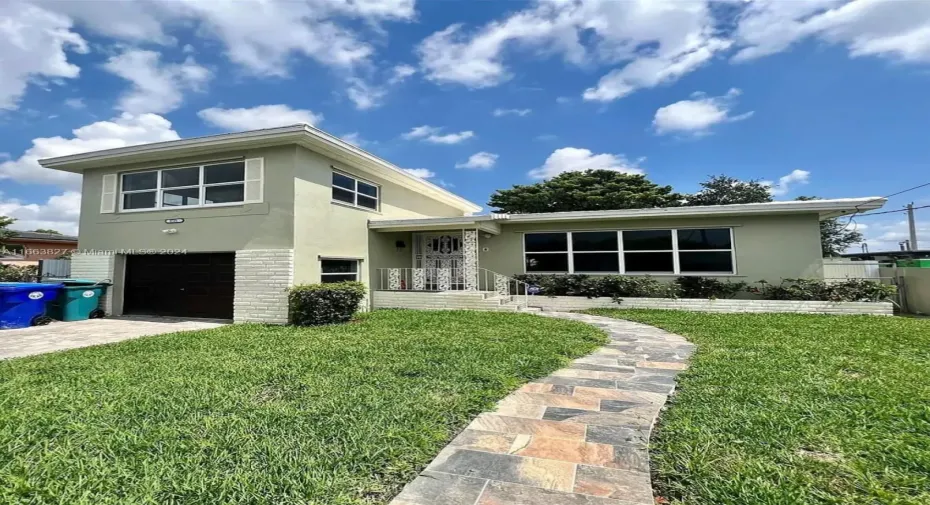 Well-manicured yard with curb appeal